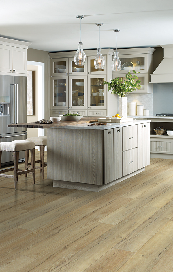 wood look luxury vinyl floors in a warm rustic kitchen